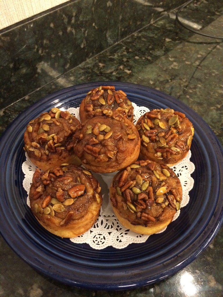 Brioche Sticky Buns with cinnamon sugar, pepitas, pecans and dried cranberries.